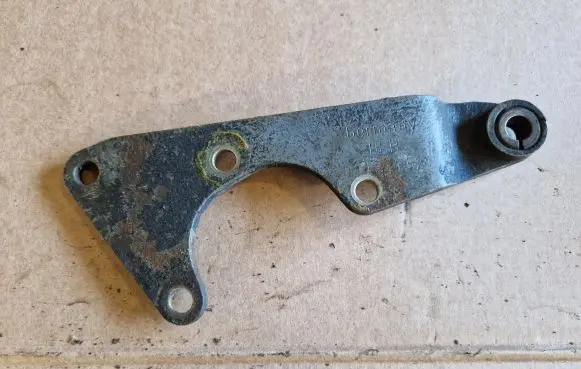 Volkswagen Golf I Power steering pump mounting bracket 037145521