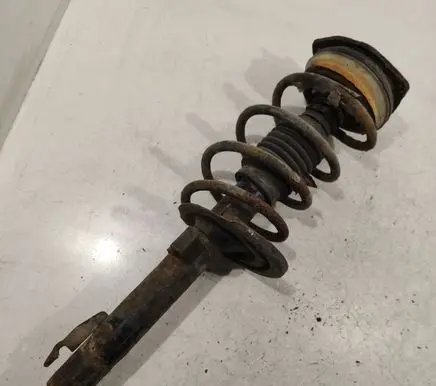 Front shock absorber with coil spring