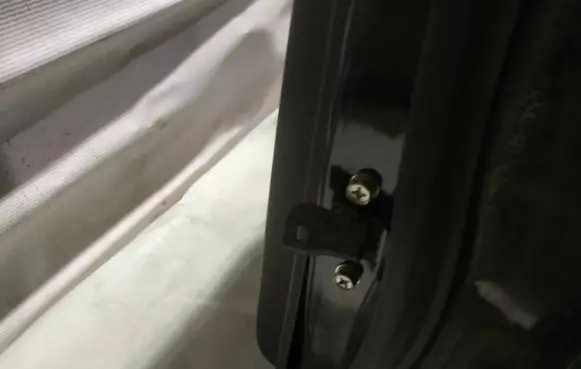 Mitsubishi Lancer Rear door check strap stopper