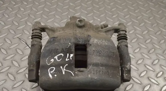 Volkswagen Golf VII Front brake caliper
