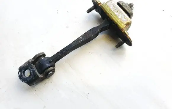 Front door check strap stopper