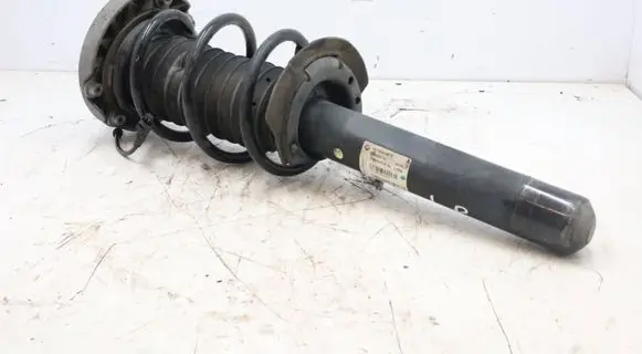 Front shock absorber with coil spring