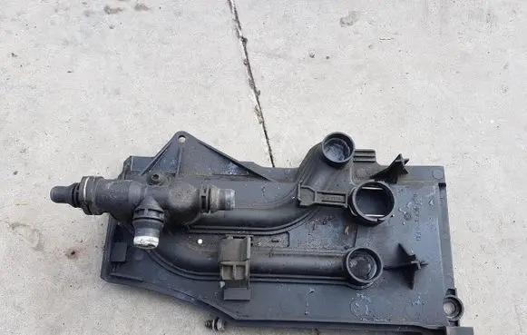 Thermostat/thermostat housing