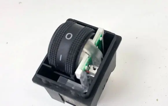 Headlight level height control switch