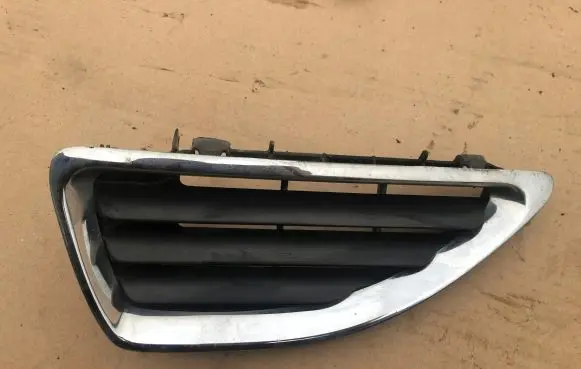 Renault Megane I Front bumper lower grill 7700428965
