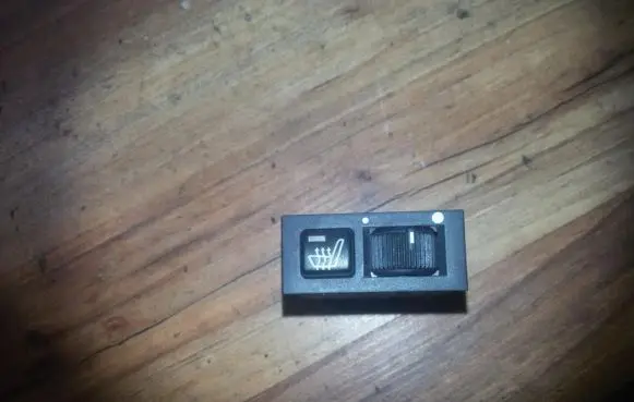 Seat heating switch