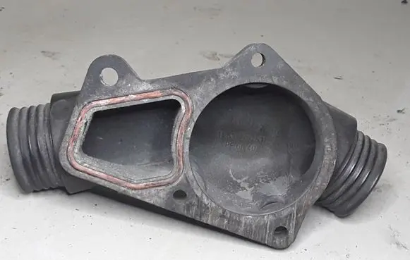 Thermostat/thermostat housing