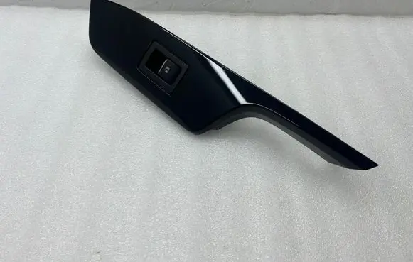 Toyota C-HR I Front door window switch trim 74231F4010