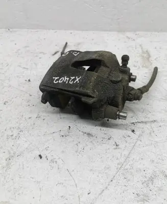 Volkswagen Golf VII Front brake caliper