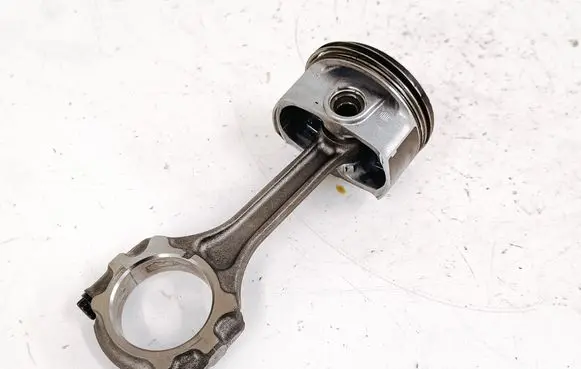 Piston with connecting rod