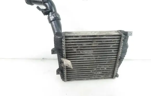 Volkswagen Touareg I Intercooler radiator 7L0145804A