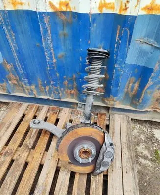 Front wheel hub spindle knuckle