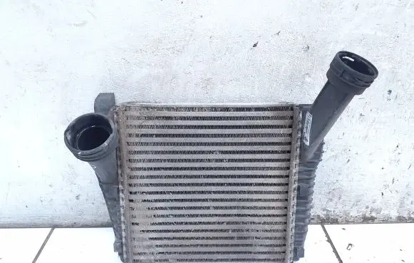 Volkswagen Touareg I Intercooler radiator 7L6145804