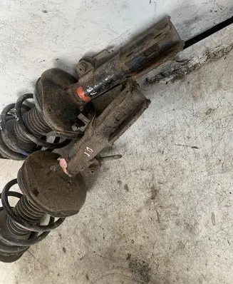 Toyota Avensis T250 Front shock absorber with coil spring