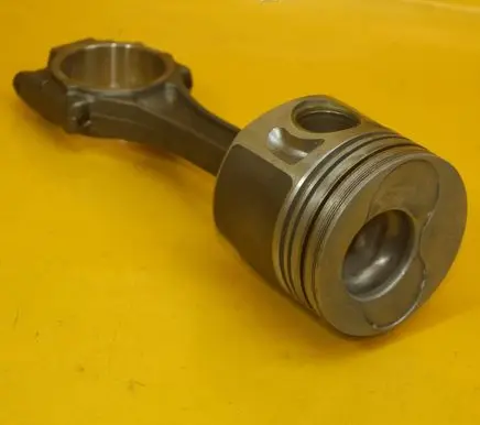 Volkswagen Golf V Piston with connecting rod 038G