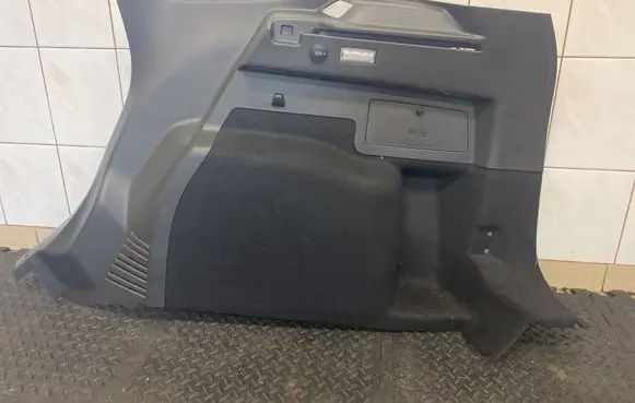 Trunk/boot side trim panel