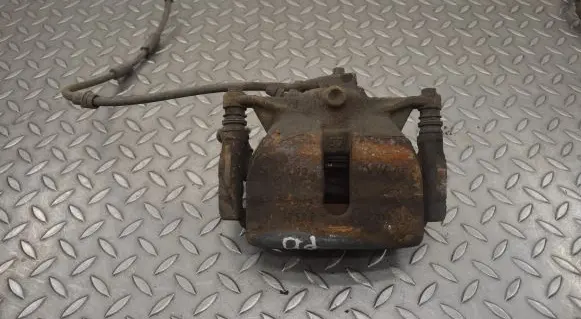 Volkswagen Golf VII Front brake caliper