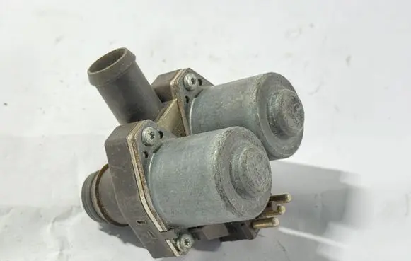 Coolant heater control valve
