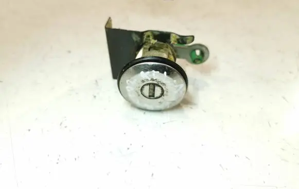 Nissan Navara D22 Front door lock (next to the handle) 