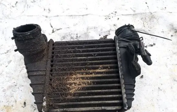 Volkswagen Golf IV Intercooler radiator 1j0145803