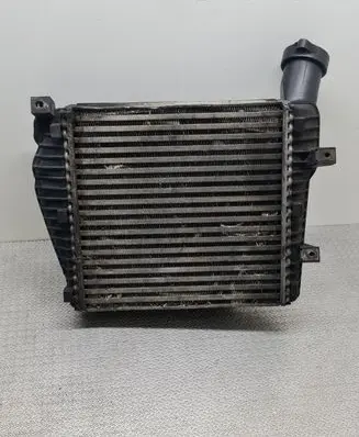 Volkswagen Touareg I Intercooler radiator 7L0145803A