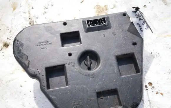 Tail light bulb cover holder