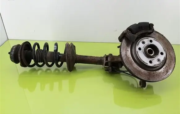 Dacia Sandero Front shock absorber with coil spring 