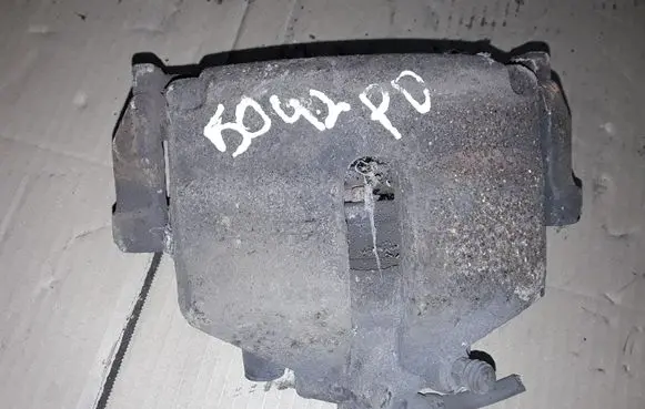 Volkswagen PASSAT B7 Front brake caliper NOCODE