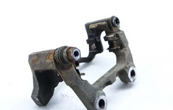 Volkswagen PASSAT CC Brake caliper pad carrier rear 3AA615426B