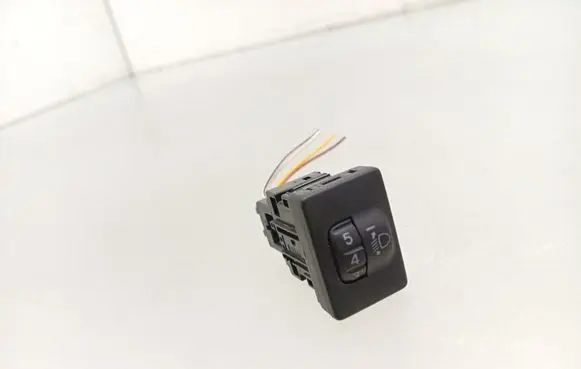 Headlight level height control switch