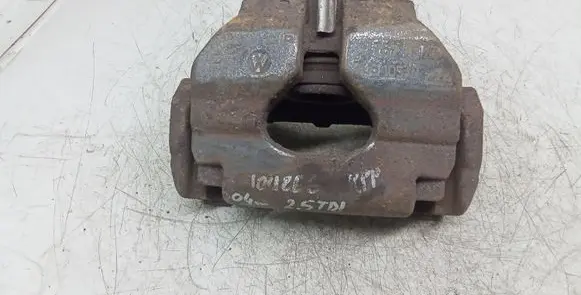 Volkswagen Touareg I Front brake caliper 767