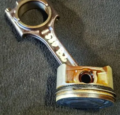 Piston with connecting rod