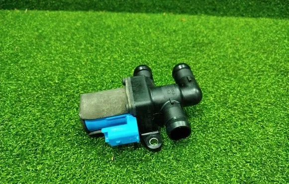 Coolant heater control valve