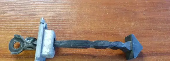 Mazda 2 Rear door check strap stopper