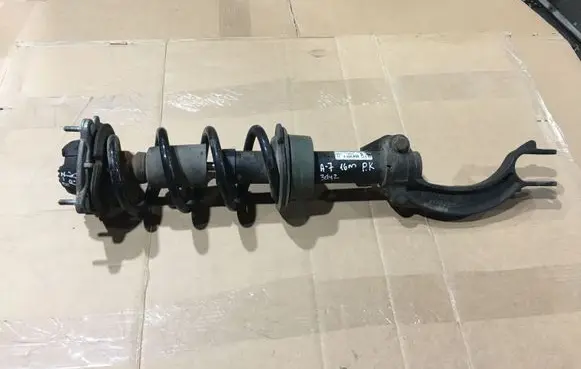 Audi A7 S7 4G Front shock absorber with coil spring 4G8031F