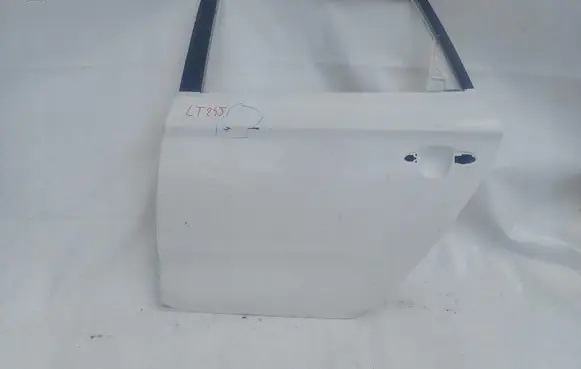 KIA Carens III Rear door