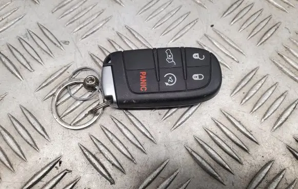 Jeep Grand Cherokee Ignition key/card 68143505AC