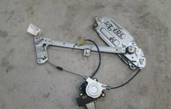 Mazda 323 F Front door window regulator with motor