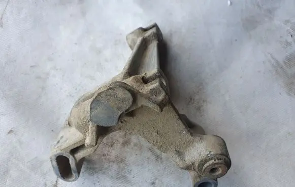 Volkswagen Golf III Power steering pump mounting bracket 028145531C
