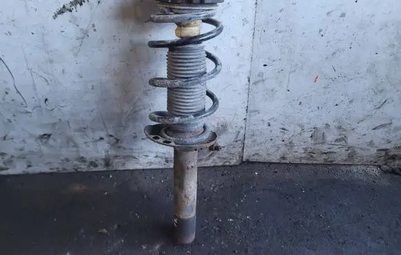 Front shock absorber with coil spring
