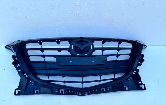Mazda 3 II Front bumper upper radiator grill BJS750712OE
