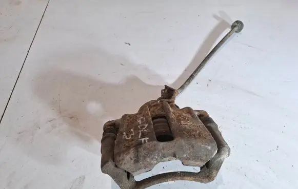 Volkswagen Golf III Front brake caliper