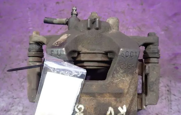 Opel Astra J Front brake caliper