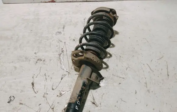 Seat Leon (1P) Front shock absorber with coil spring