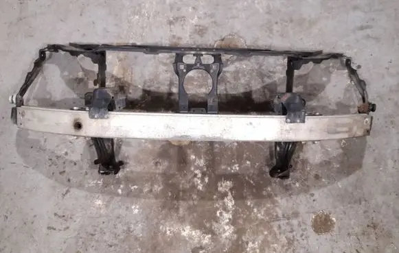 Radiator support slam panel