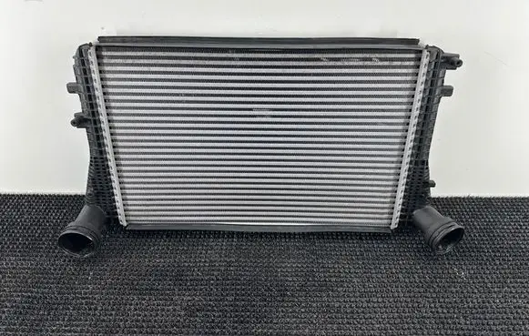 Volkswagen Touran II Intercooler radiator 1K0145803T