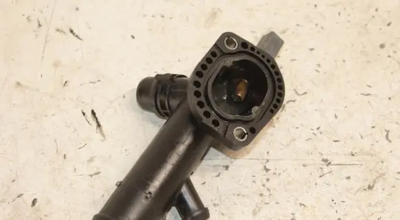 Thermostat/thermostat housing