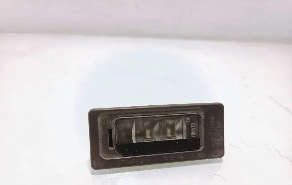 Volkswagen Touran II Number plate light 3AF943021A