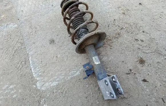 Citroen C4 I Front shock absorber with coil spring