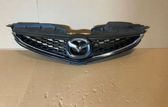 Mazda 6 Front bumper upper radiator grill 50712